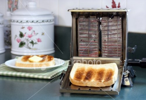 1361ist2_5562643-vintage-toaster-with-toast.jpg