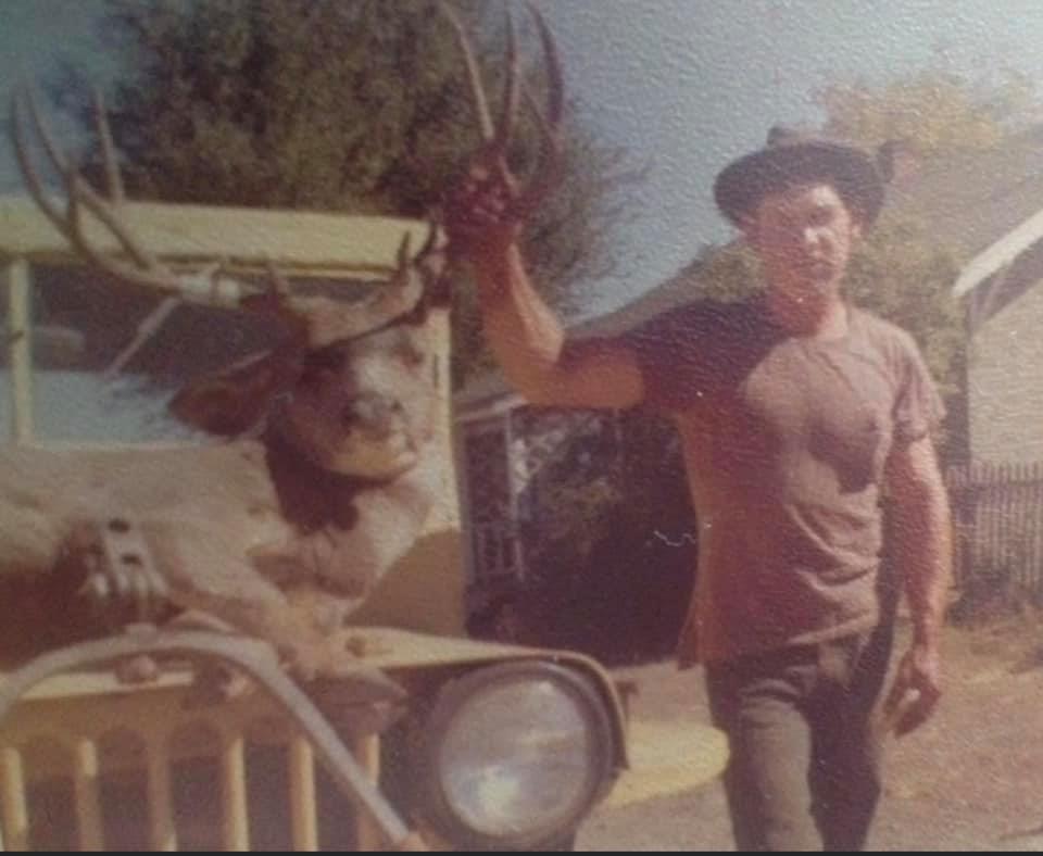 Dad Norman with big buck 1962.jpg