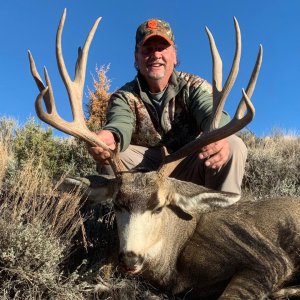 Unit 231 Trophy Buck with White River Guide Service.jpg