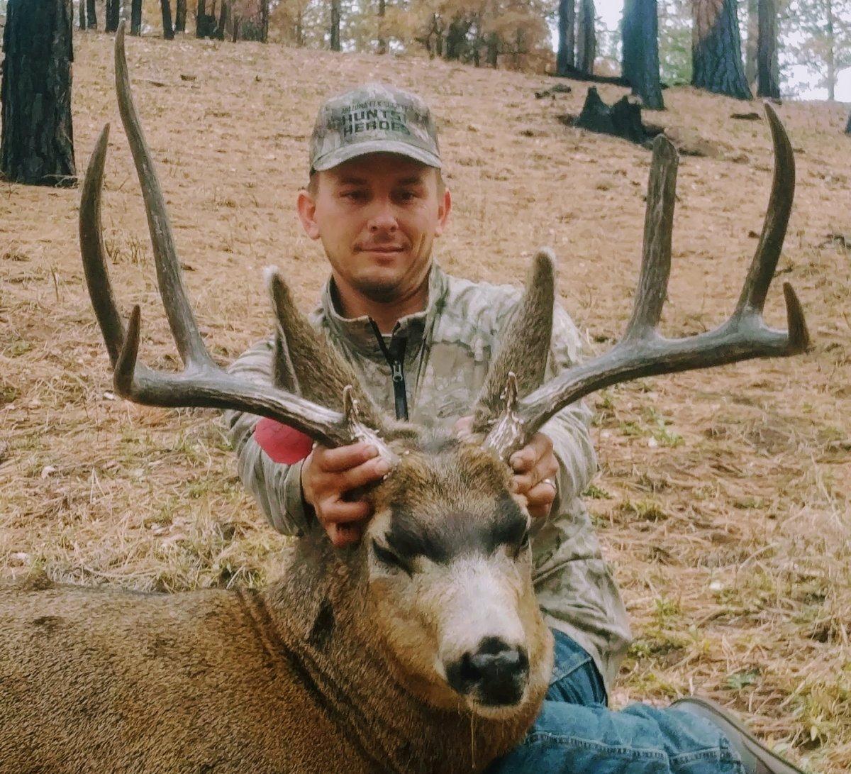 Jeremy Osborn with his last day buck on the Kaibab